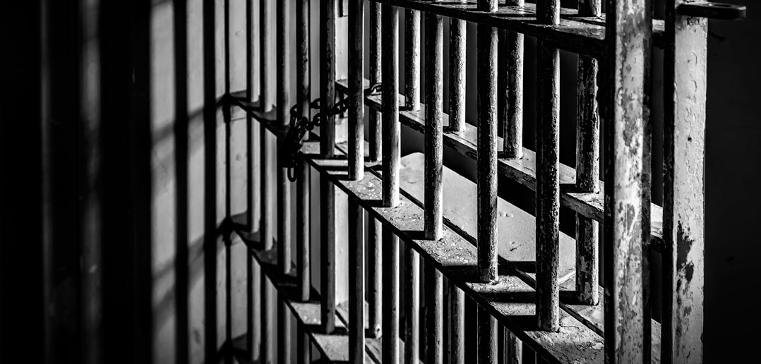 prison-bars-istock-36501524-xxlarge-1078x516.jpg