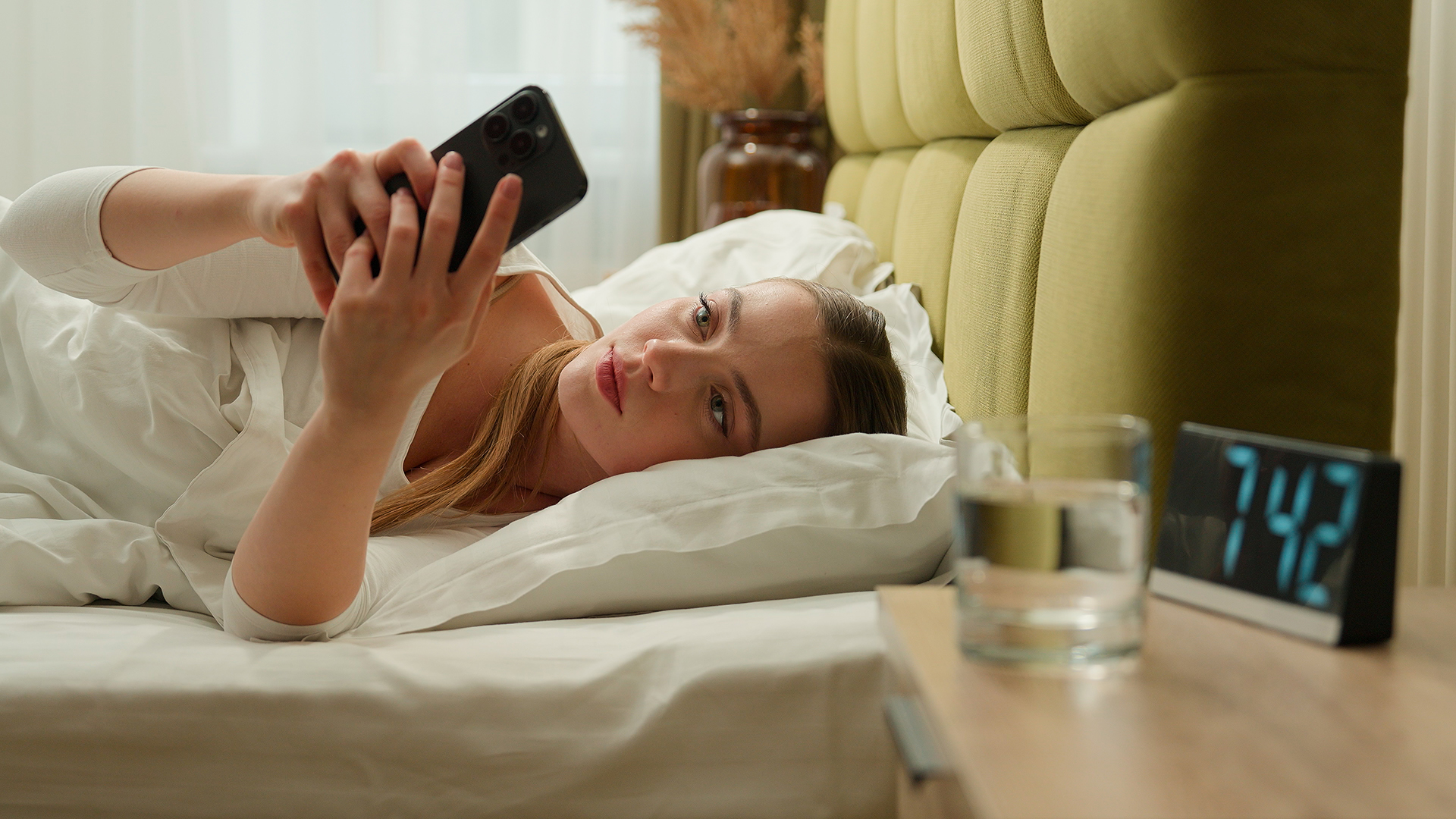 feature-caucasian-female-woman-lady-girl-home-bedroom-relax-comfortable-bed-early-morning-using-mobile.jpg