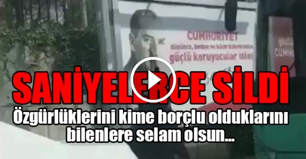 Başörtülü kadın Atatürk'ün resmini böyle sildi